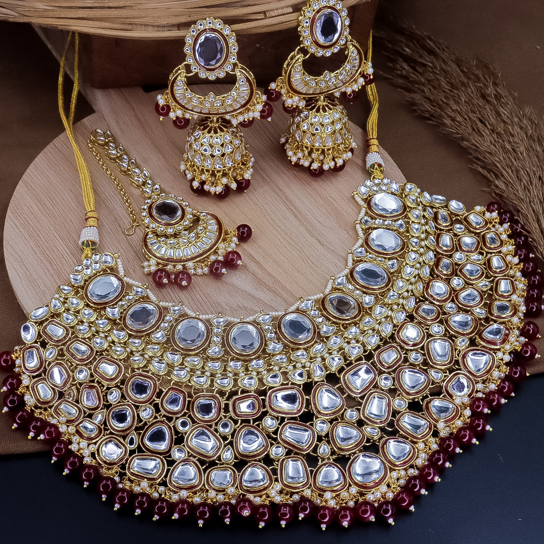 Nimrat Semi Bridal Choker Set With Jhumka + Teeka - Maroon